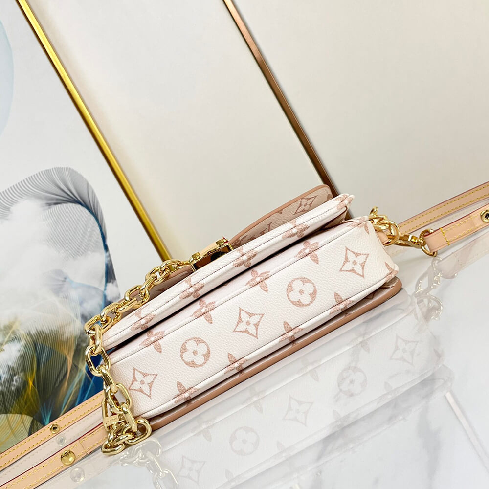 16482-5 LV Pochette Metis East West